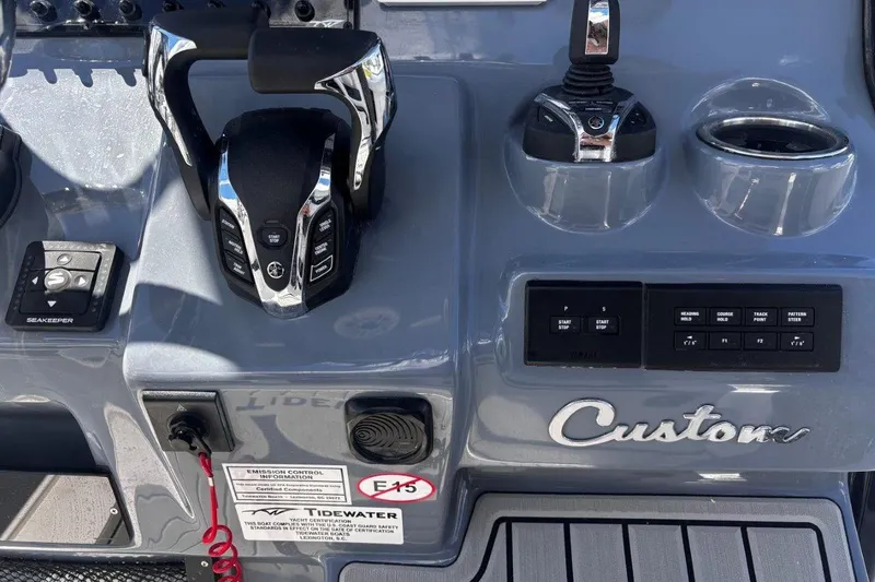 Slide: The Image of Control panel of 2026 Tidewater 272 LXF boat with advanced navigation features. - 31