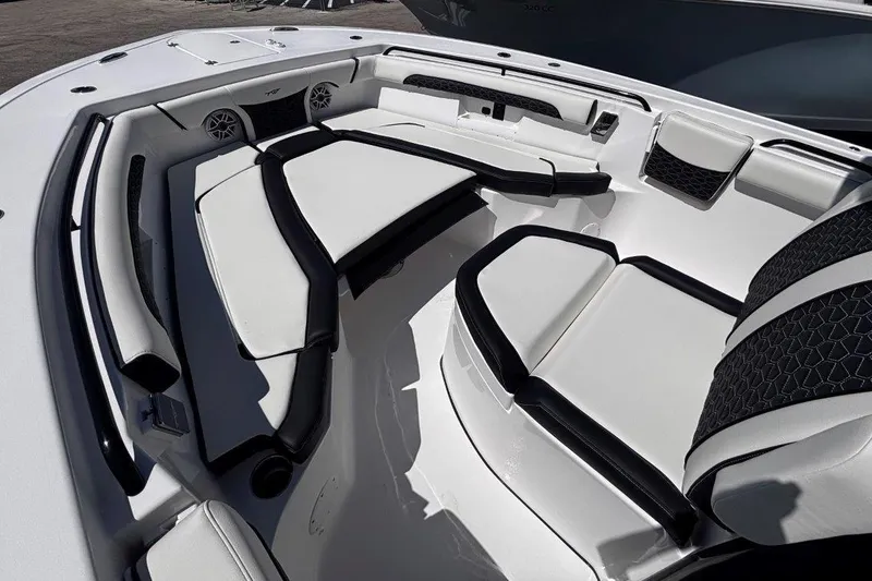 Slide: The Image of 2026 Tidewater 272 LXF boat interior with luxurious seating and modern design. - 36