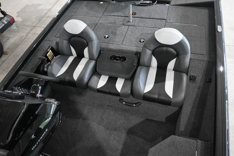 Slide: The Image of 2026 Vexus AVX181 DEFENDER boat interior with dual seats and steering console. - 12