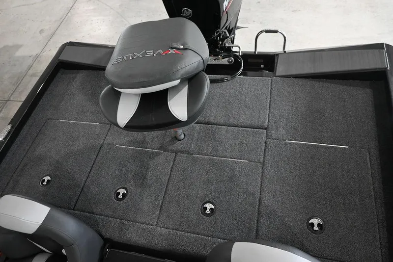 Slide: The Image of 2026 Vexus AVX181 DEFENDER boat interior with cushioned seating and storage compartments. - 9