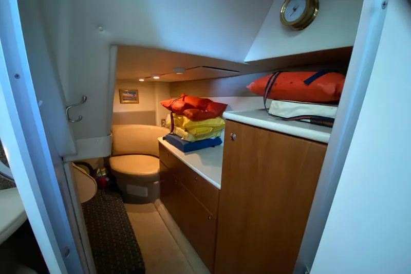 Slide: The Image of Interior cabin of 2005 Bayliner 325 boat with seating and storage. - 20