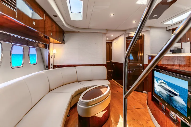 Slide: The Image of Luxurious interior of 2008 Sea Ray 60 Sundancer yacht with elegant seating and modern amenities. - 12