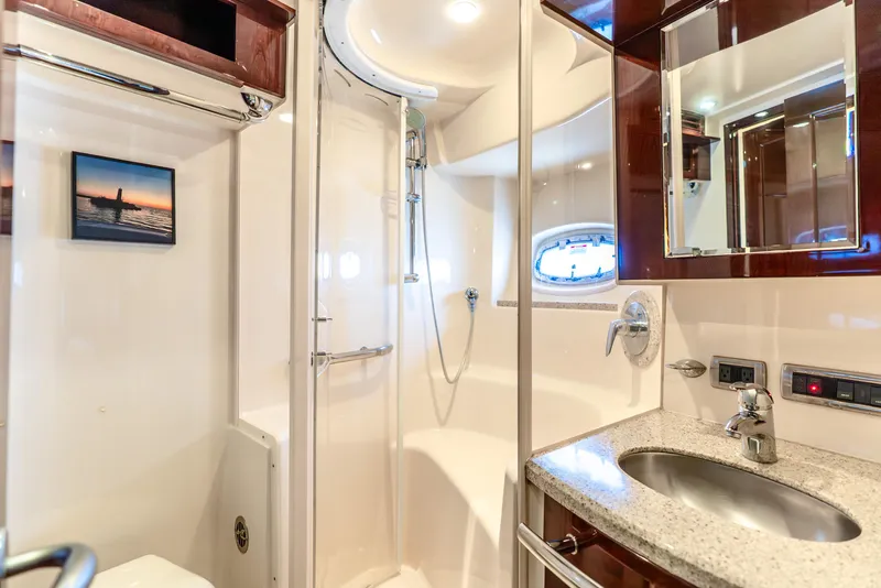 Slide: The Image of Luxurious bathroom in 2008 Sea Ray 60 Sundancer yacht with modern fixtures and elegant design. - 14