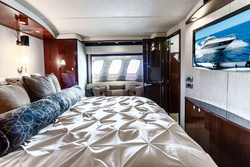 Slide: The Image of Luxurious bedroom interior of 2008 Sea Ray 60 Sundancer yacht with elegant bedding and modern decor. - 19