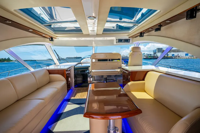 Slide: The Image of Luxurious interior of 2008 Sea Ray 60 Sundancer yacht with leather seating and panoramic windows. - 25