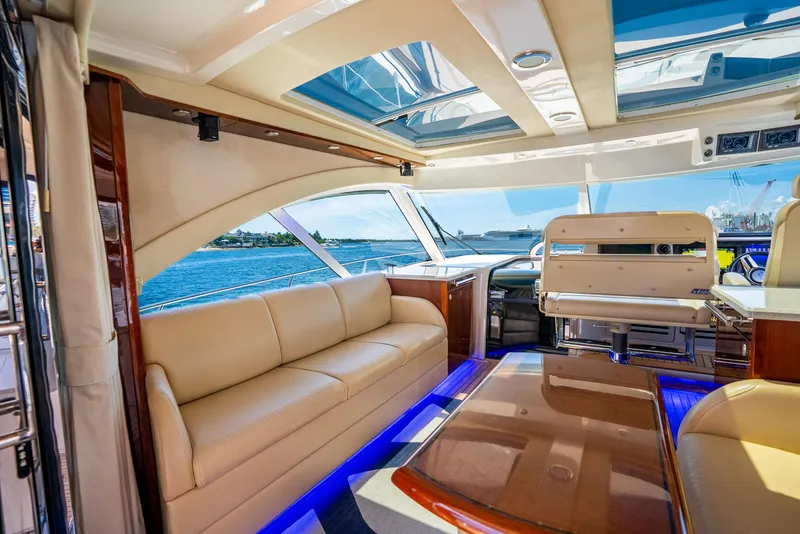 Slide: The Image of Luxurious interior of 2008 Sea Ray 60 Sundancer yacht with panoramic ocean view. - 26