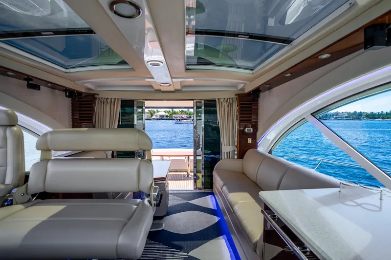 Slide: The Image of Luxurious interior of 2008 Sea Ray 60 Sundancer yacht with panoramic water views. - 40