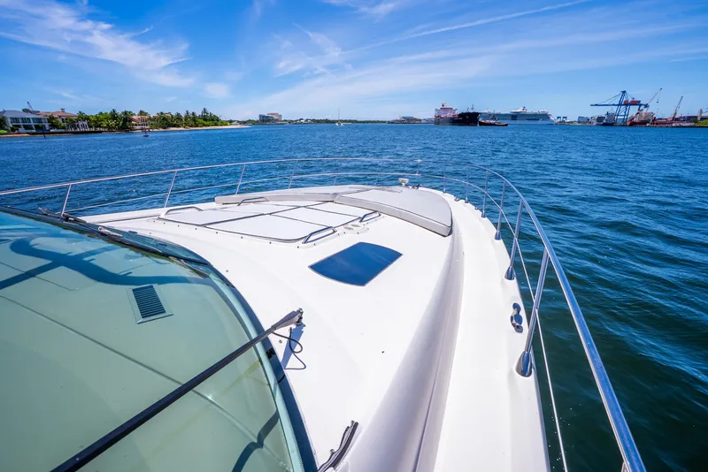Slide: The Image of 2008 Sea Ray 60 Sundancer yacht cruising on a sunny day with clear blue skies. - 44