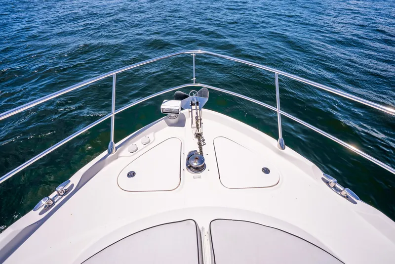Slide: The Image of Bow of 2008 Sea Ray 60 Sundancer yacht on open water. - 45