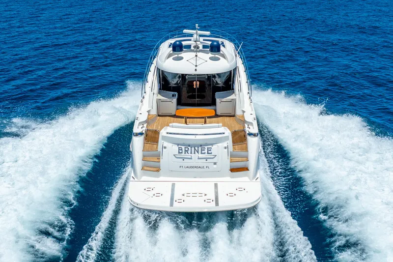 Slide: The Image of 2008 Sea Ray 60 Sundancer yacht cruising on open blue water. - 6