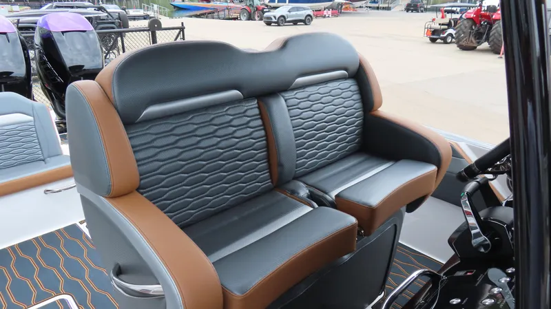Slide: The Image of 2023 Sunsation 32 CCX boat interior with stylish seating and modern design. - 14