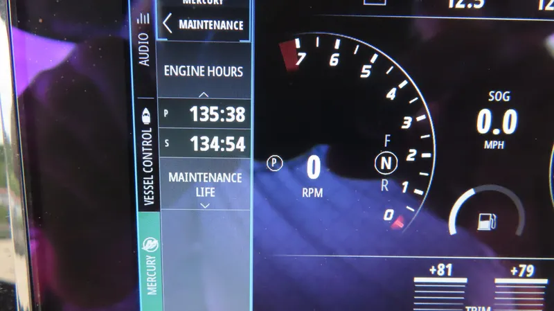 Slide: The Image of Dashboard of 2023 Sunsation 32 CCX showing engine hours and RPM gauge. - 27