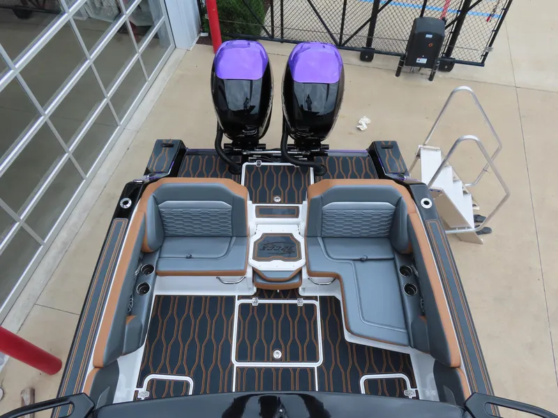 Slide: The Image of 2023 Sunsation 32 CCX boat interior with dual engines, luxury seating, and modern design. - 7