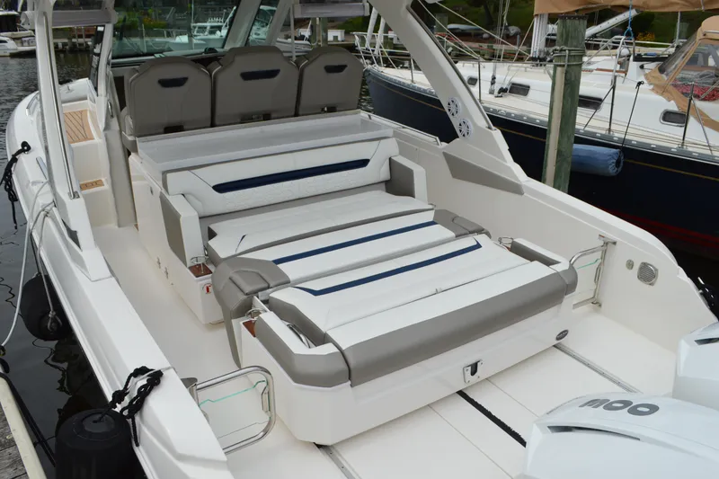 Slide: The Image of 2023 Tiara Yachts 34 LS luxury boat interior with seating and modern design. - 22