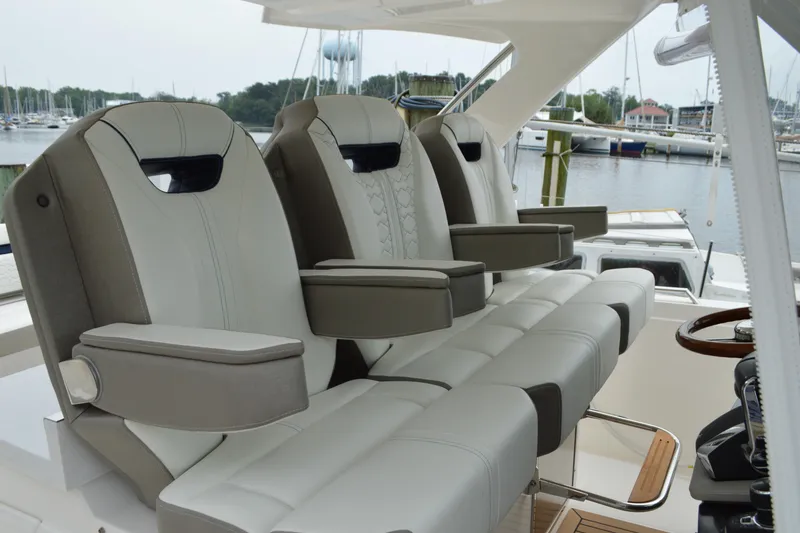 Slide: The Image of Luxury seating on 2023 Tiara Yachts 34 LS, featuring elegant design and comfort. - 37