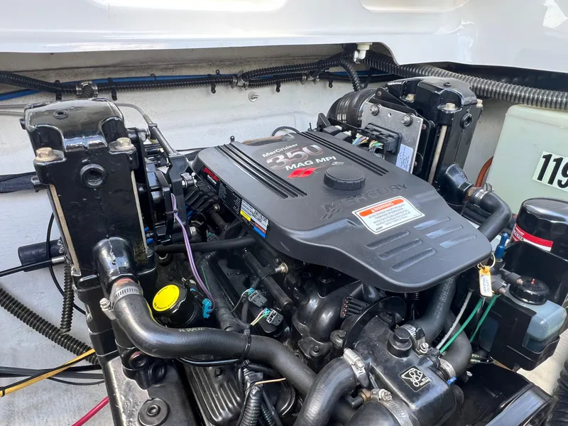 Slide: The Image of Engine of 2006 Crownline 270 BR boat, featuring a Mercury 350 MAG MPI. - 29