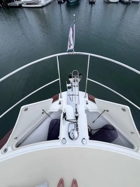 Slide: The Image of Bow view of 2021 Sabre 45 Salon Express yacht at dock. - 19