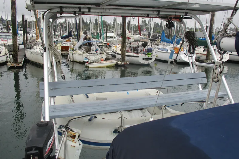 Slide: The Image of 1978 Moody 33 MkI sailboat docked in a busy marina with other boats. - 6