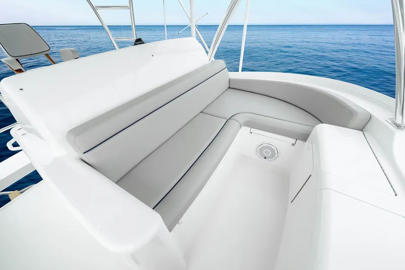 Slide: The Image of Luxurious seating on 2027 Viking 82 Skybridge yacht with ocean view. - 25