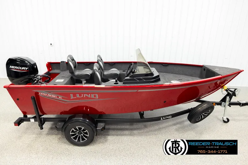The Image of 2026 Lund 1650 Rebel XL SS boat, red exterior, on trailer, with Mercury engine. - 0