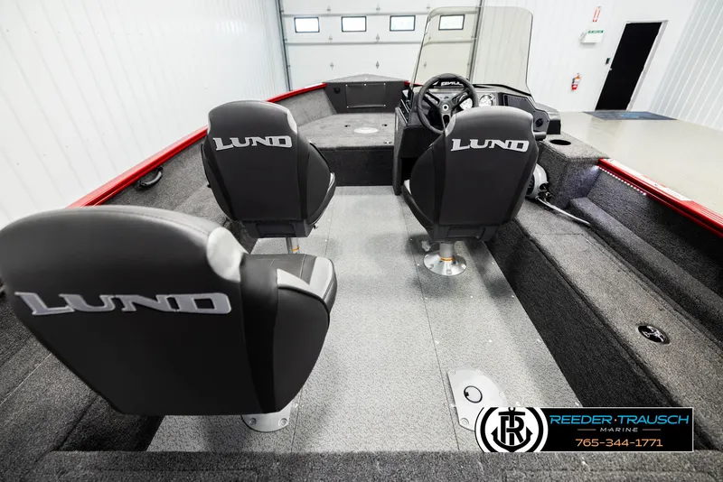 Slide: The Image of Interior of 2026 Lund 1650 Rebel XL SS boat with two seats and steering console. - 10