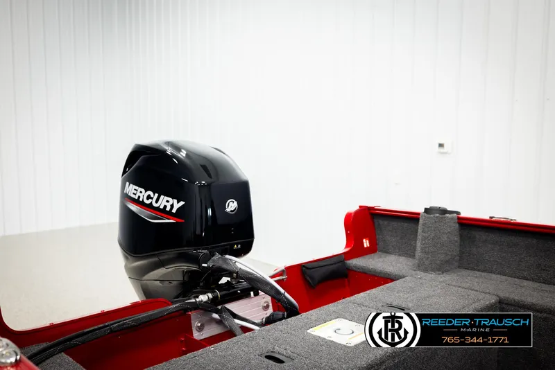 Slide: The Image of 2026 Lund 1650 Rebel XL SS boat with Mercury outboard motor in showroom. - 25