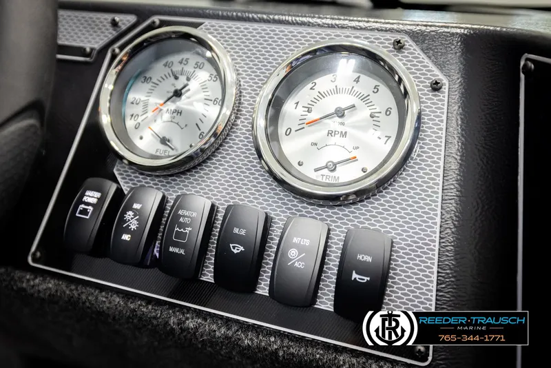 Slide: The Image of Dashboard of 2026 Lund 1650 Rebel XL SS with gauges and control switches. - 31
