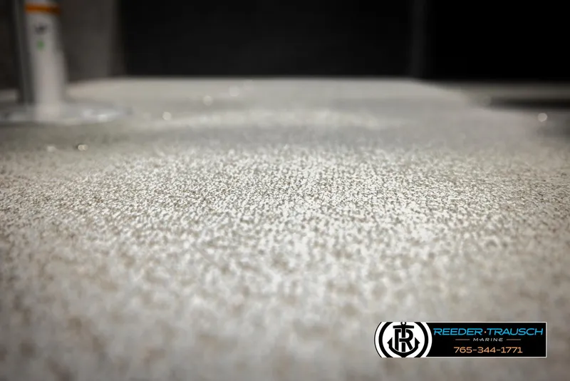 Slide: The Image of Carpeted deck of 2026 Lund 1650 Rebel XL SS boat, close-up view. - 37