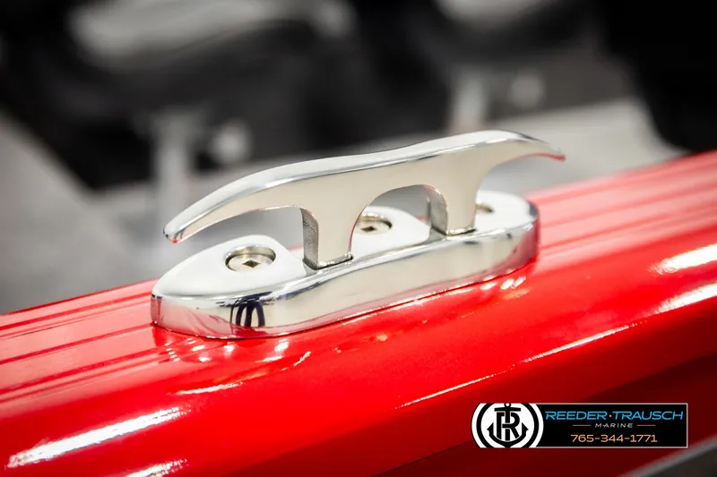 Slide: The Image of Chrome cleat on red Lund 1650 Rebel XL SS boat, 2026 model. - 49