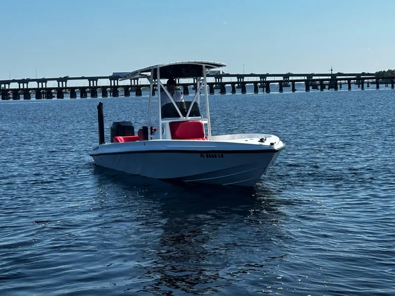 Slide: The Image of Boat on water with bridge in background, Concept 23 model, year 2000. - 2