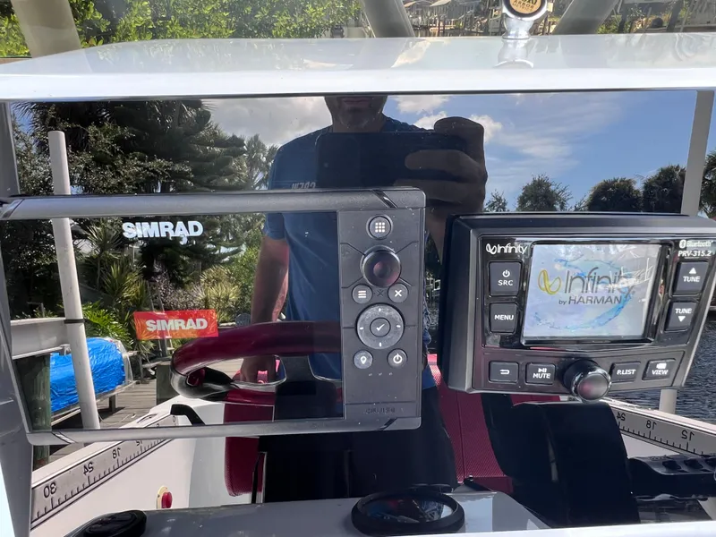 Slide: The Image of Boat dashboard featuring Simrad and Infinity by Harman displays, Concept 23 model, year 2000. - 22