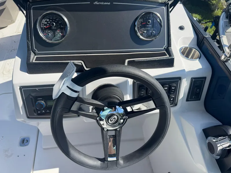 Slide: The Image of Steering wheel and dashboard of 2026 Hurricane FunDeck 1960 RE OB boat. - 11