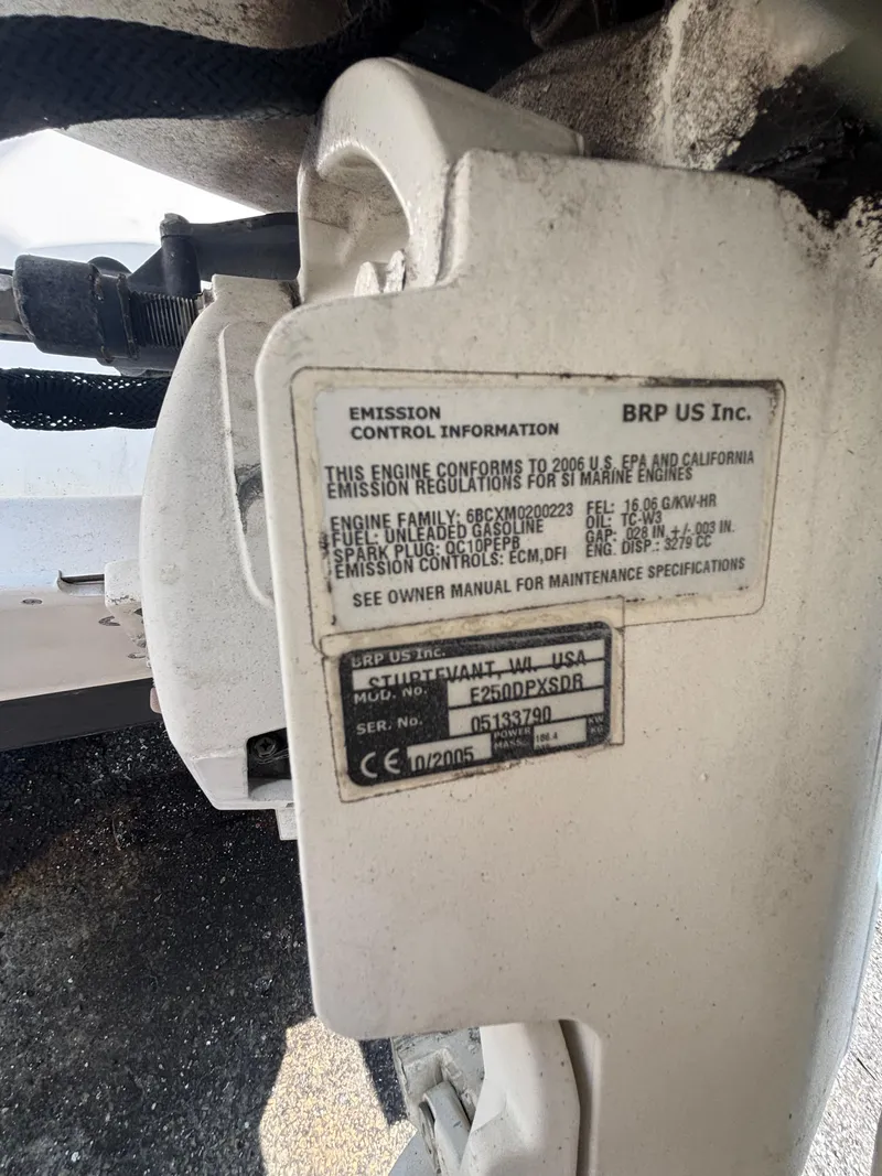 Slide: The Image of Emission control label on a 1996 Superboat 24 engine, detailing compliance and specifications. - 18