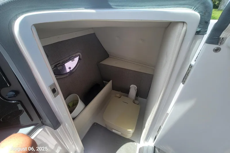 Slide: The Image of 2018 Colbalt 26SD boat interior with compact Head - 12