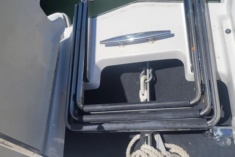 Slide: The Image of 2018 Cobalt 26SD boat forward ladder and anchor storage area. - 15
