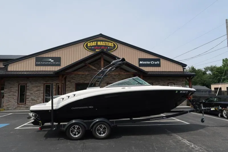 The Image of 2021 Chaparral 23 SSi boat on trailer outside Boat Masters dealership. - 1