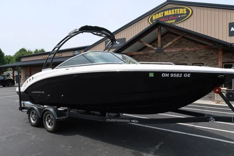 Slide: The Image of 2021 Chaparral 23 SSi boat on trailer at dealership. - 3