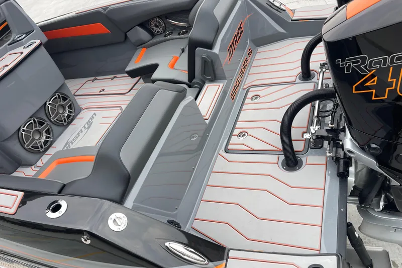 Slide: The Image of 2025 Sunsation 32 CCX boat interior with sleek seating and modern design elements. - 11