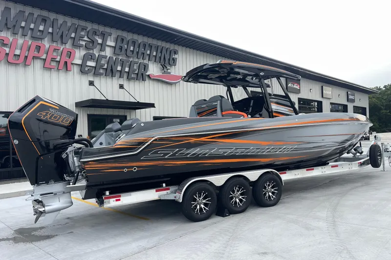 Slide: The Image of 2025 Sunsation 32 CCX boat on trailer at Midwest Boating Super Center. - 2