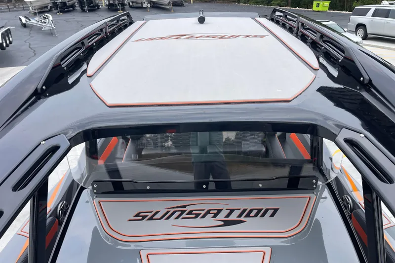 Slide: The Image of 2025 Sunsation 32 CCX boat with sleek design and modern detailing. - 25