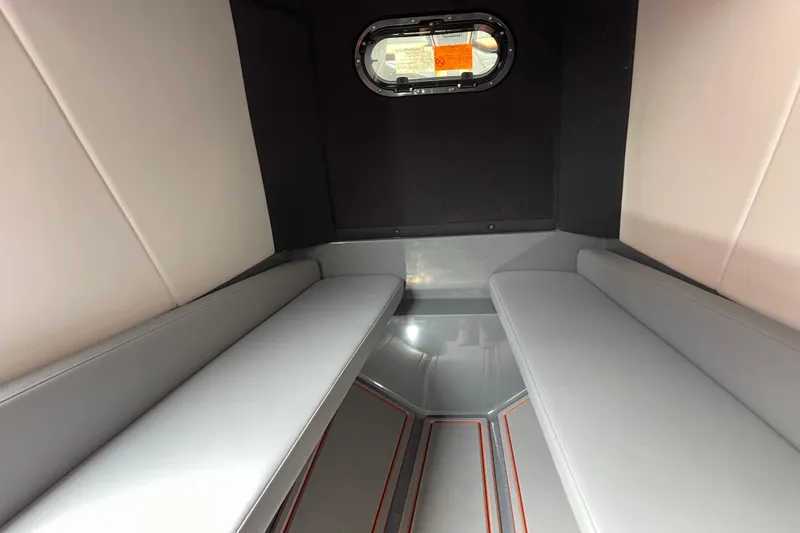Slide: The Image of Interior cabin of 2025 Sunsation 32 CCX boat with sleek seating and window. - 27