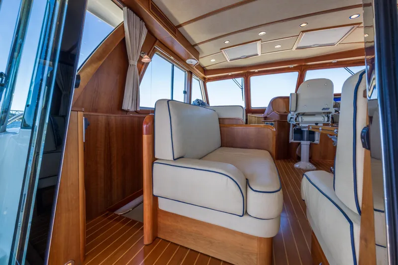 Slide: The Image of Interior of 2014 Sabre 48 Salon Express yacht with elegant wood and leather seating. - 21