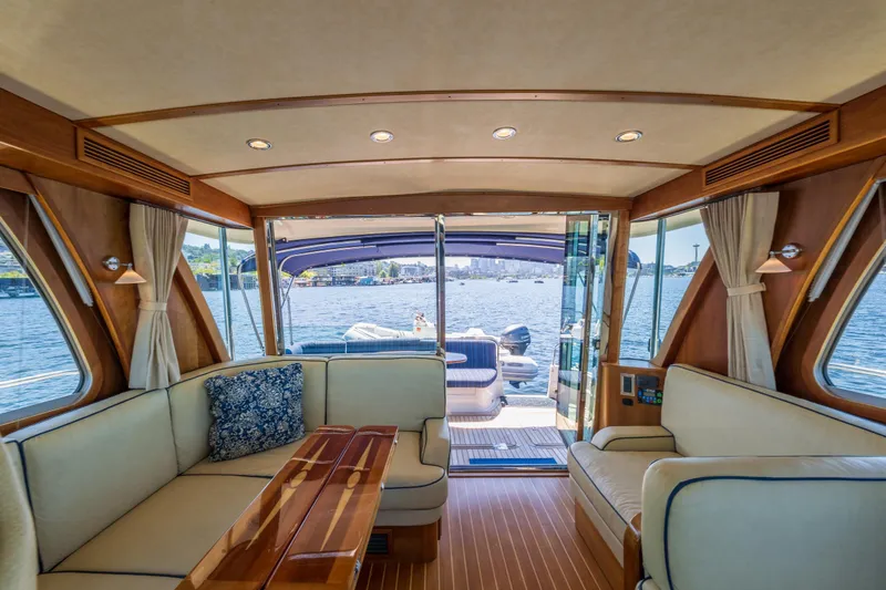 Slide: The Image of Luxurious interior of 2014 Sabre 48 Salon Express yacht with waterfront view. - 23