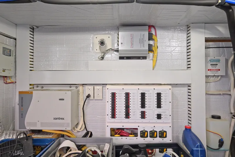 Slide: The Image of Electrical panel and equipment in a 2014 Sabre 48 Salon Express yacht. - 47
