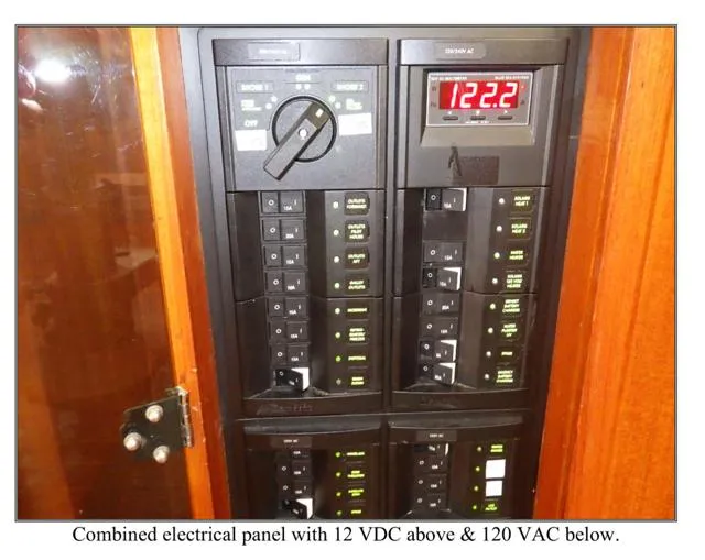 Slide: The Image of Electrical panel on 1979 Ocean Alexander Mark 1 55 yacht, showing 12 VDC and 120 VAC systems. - 28