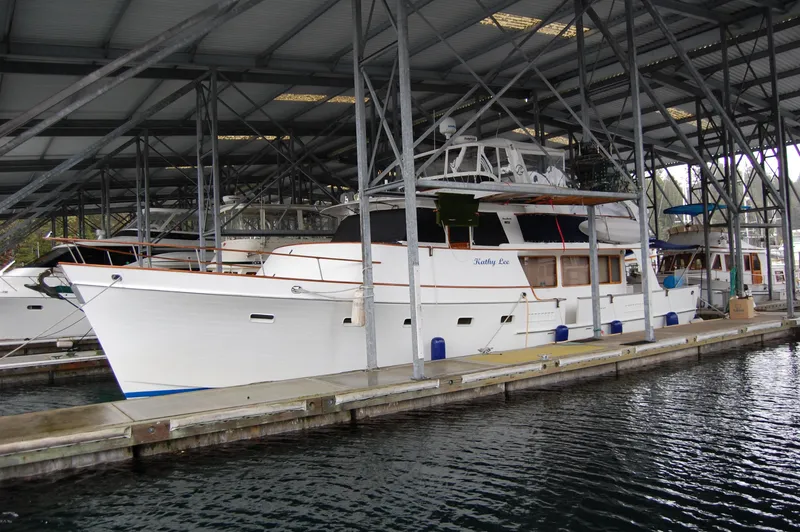 Slide: The Image of 1979 Ocean Alexander Mark 1 55 yacht docked in a covered marina. - 8