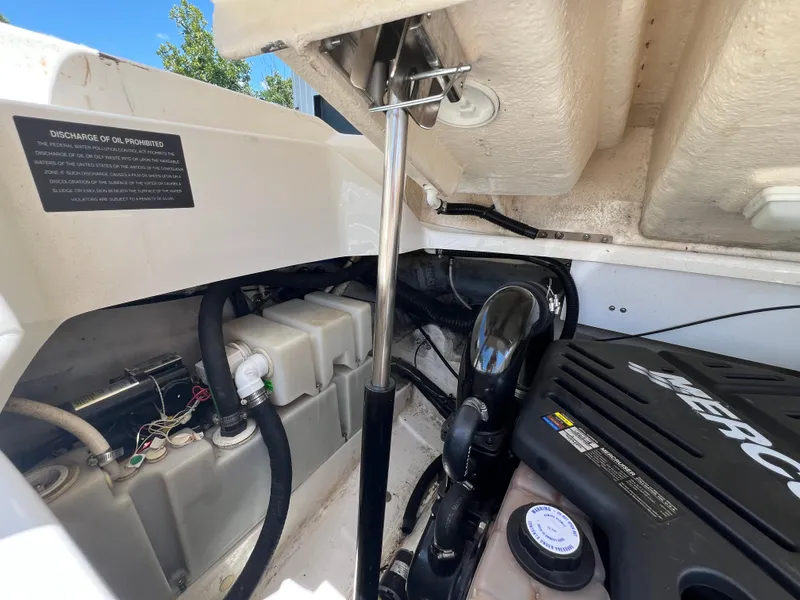 Slide: The Image of Engine compartment of a 2007 Sea Ray 270 SLX boat, featuring a MerCruiser engine. - 23
