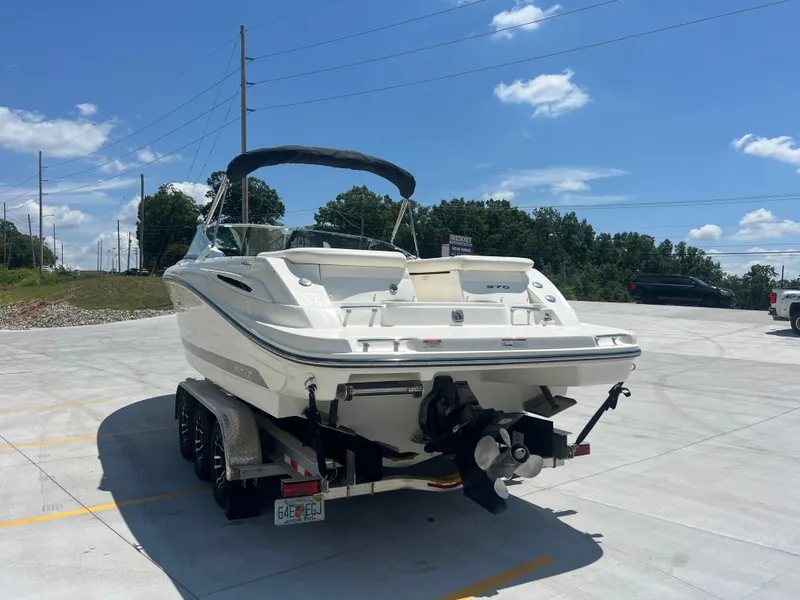 Slide: The Image of 2007 Sea Ray 270 SLX boat on trailer in sunny parking lot. - 4