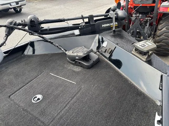 Slide: The Image of 2016 Triton 17 CTX boat deck with Minn Kota trolling motor and control panel. - 8