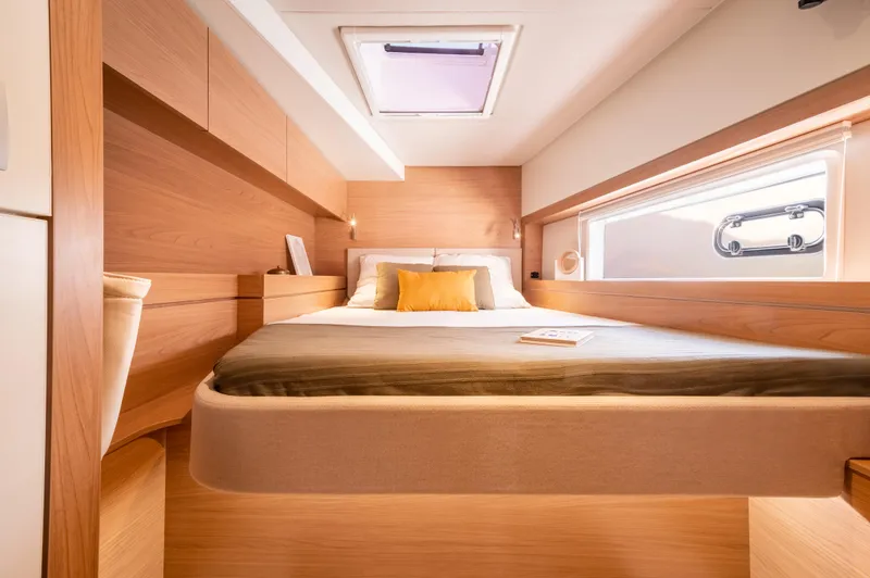 Slide: The Image of Luxurious cabin interior of 2026 Bali 4.4 yacht with modern design and cozy bedding. - 21